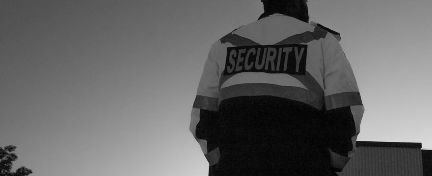 A security guard surveying the area