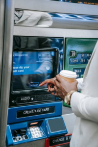 An image of a person using an ATM 